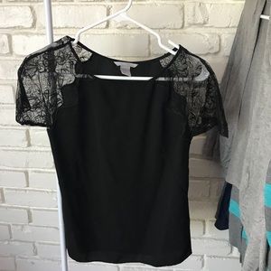 LIKE NEW Black blouse with lacey shoulder detail